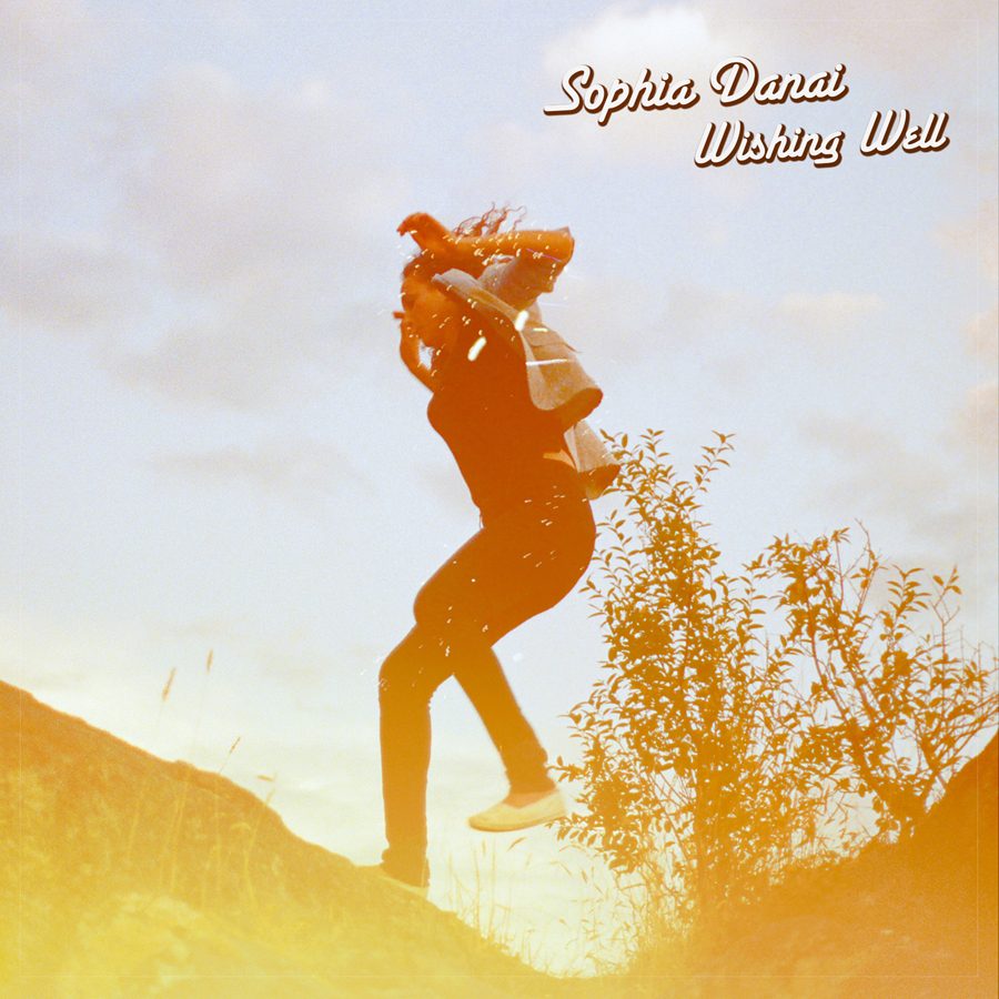 Sophia Danai — Wishing Well EP cover, sun-flared silhouette on a hillside, designed by James Marshel